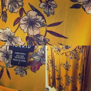 Yellow blouse with floral design